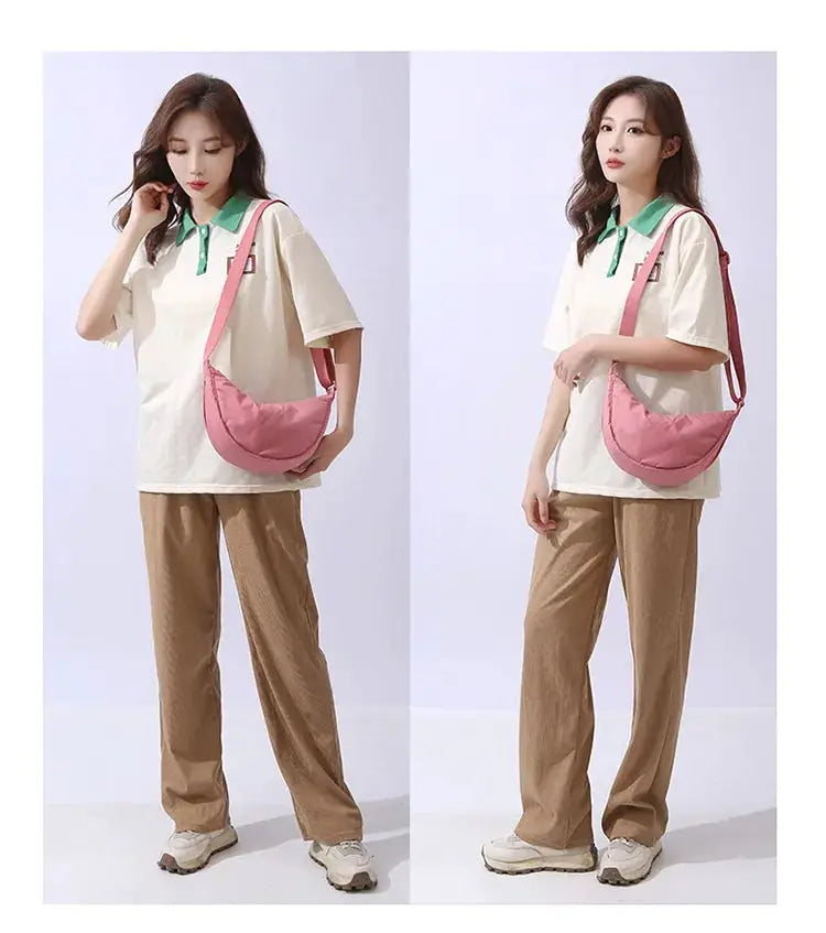 Pink solid nylon padded crossbody bag with adjustable shoulder strap; portable travel purse.