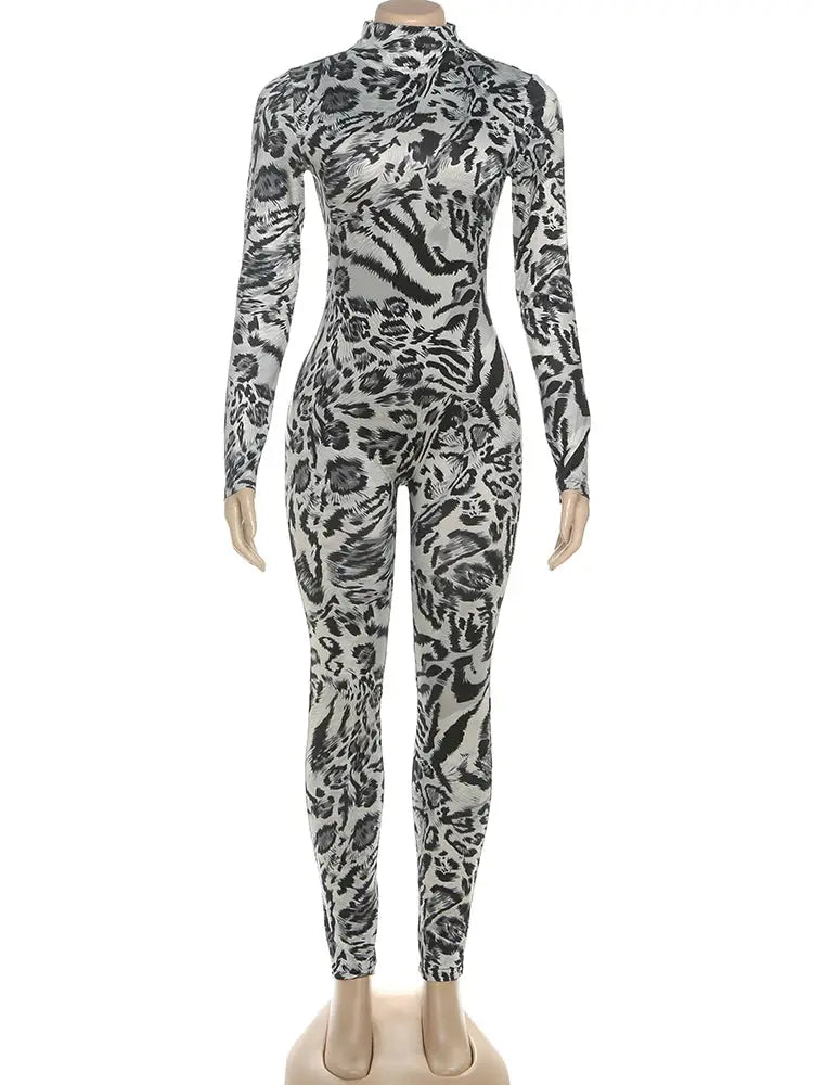 Leopard print jumpsuit with gray/black pattern, turtleneck, long sleeves, skinny full-length legs.