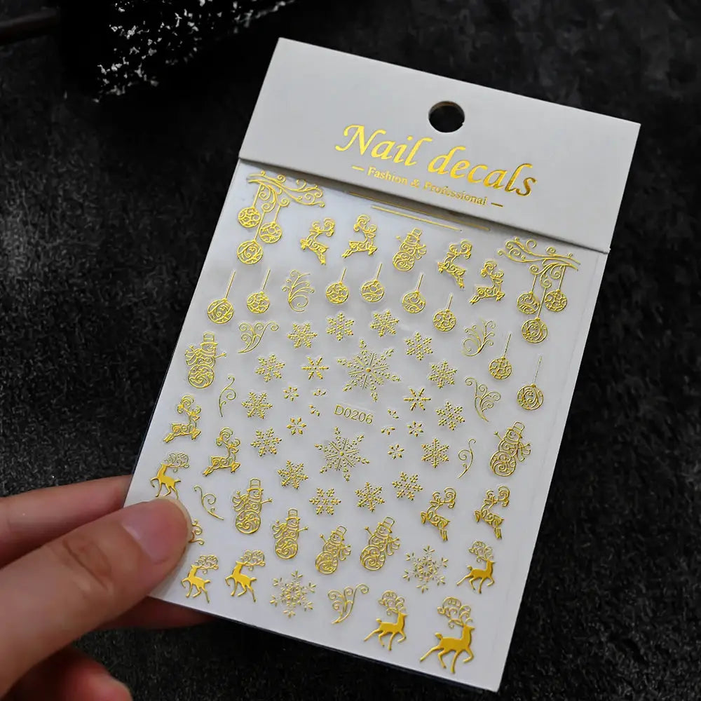 Winter Christmas nail stickers set by Simples Market; gold self-adhesive snowmen, snowflakes, deer decor