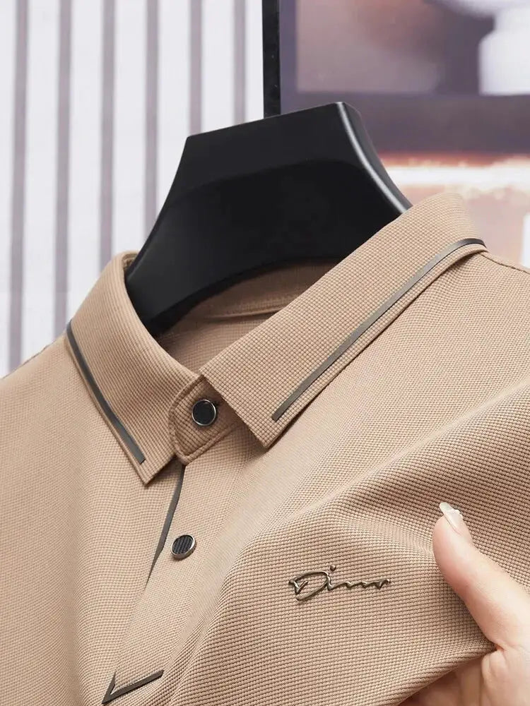 Beige Simples Market men's polo shirt with polo collar, button placket, and chest logo embroidery.