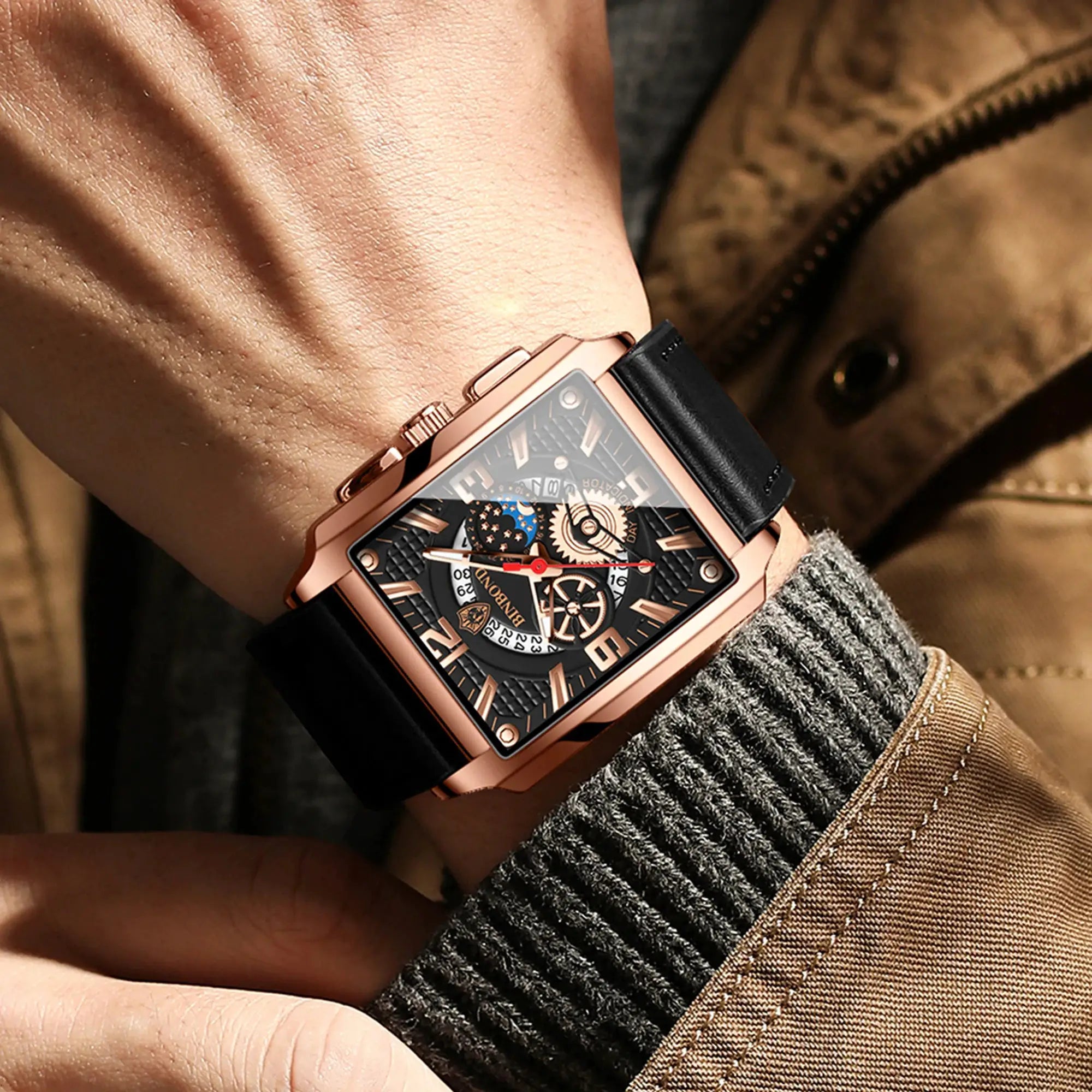 BINBOND men's rectangular skeleton watch with rose gold case and black strap
