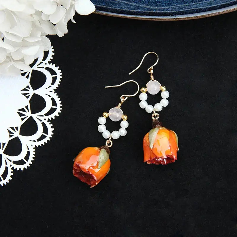 Simples Market orange-red rose epoxy resin drop earrings, pair with white bead hoops and gold-tone hooks