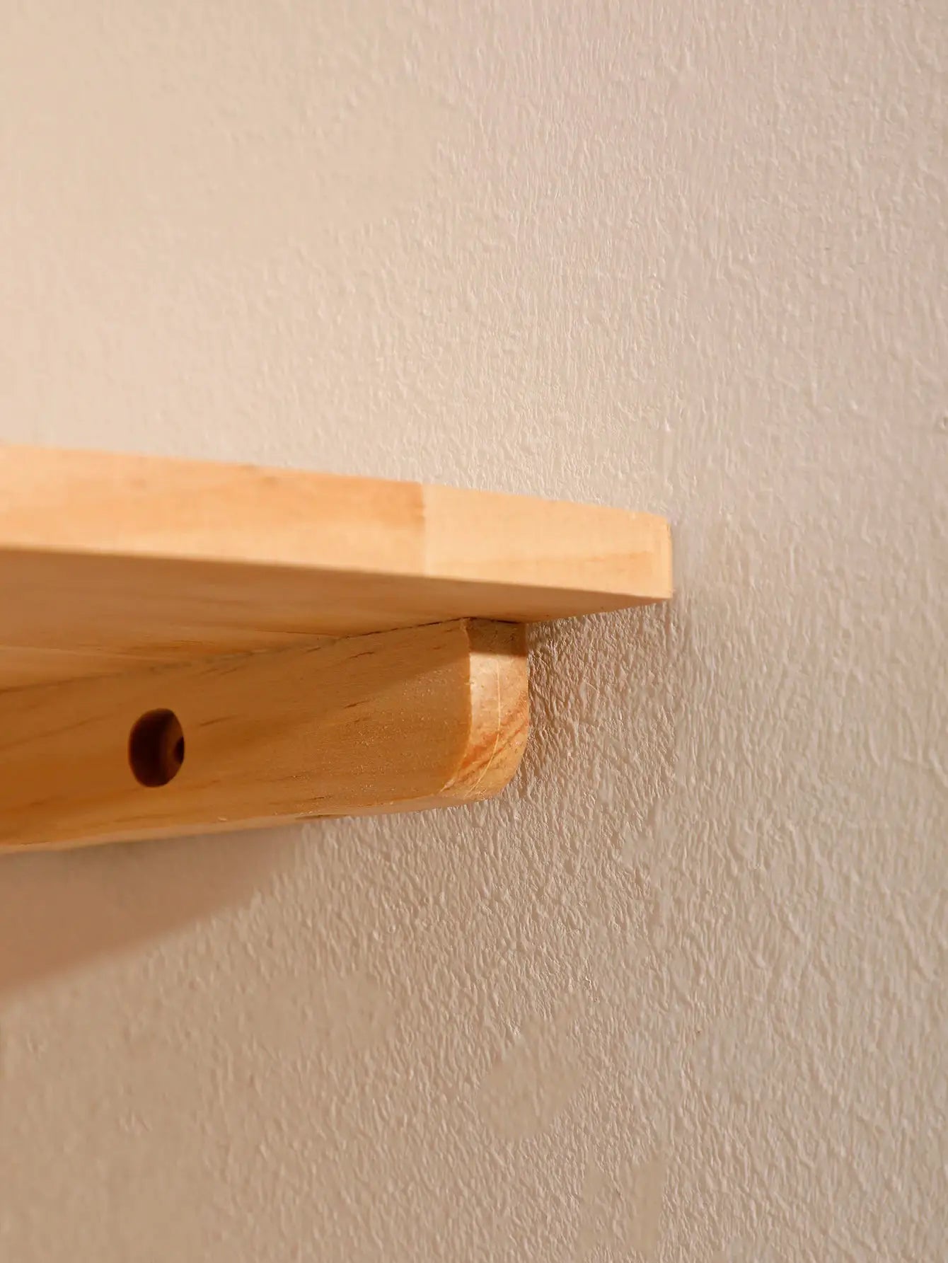 Wood wall corner shelf, natural pine finish, floating with rounded end
