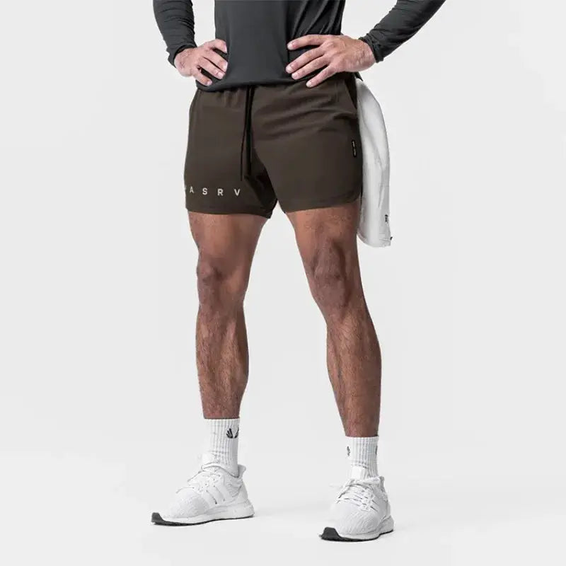 ASRV men's quick-dry basketball shorts in dark olive with ASRV logo on left leg.