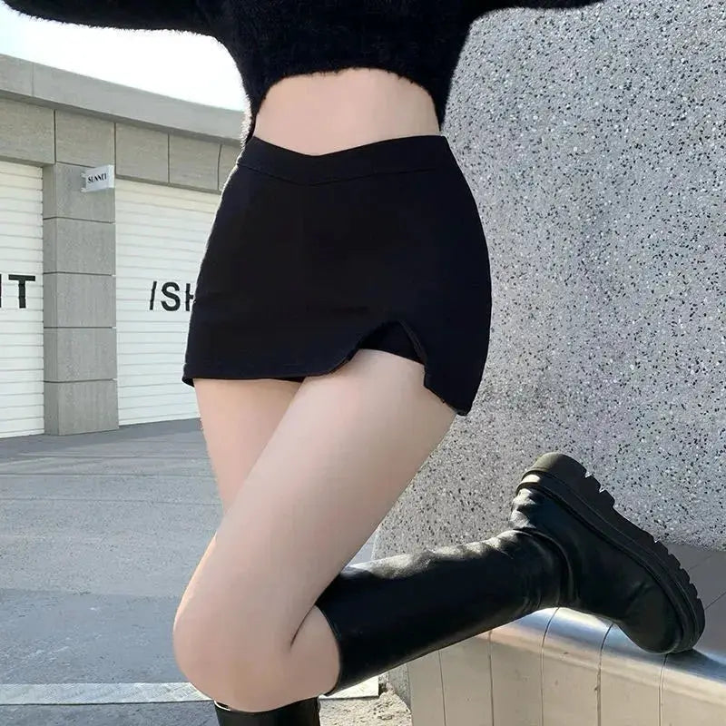 Women's black split mini skirt with high waist, curved hem and slit, irregular A-line streetwear
