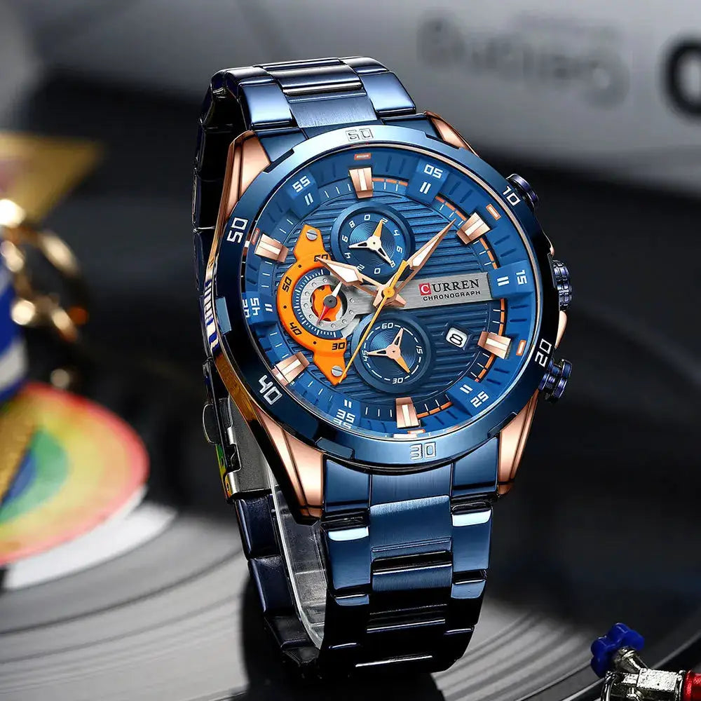 CURREN 8402 wristwatch by Simples Market; blue stainless steel chronograph with luminous dial and rose-gold accents.