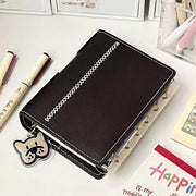 A7 dark brown faux leather planner with white contrast stitching and detachable loose-leaf pages, 80 pages