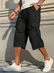 Manfinity Homme men's casual cargo capri pants in black with drawstring, baggy fit and cargo pockets