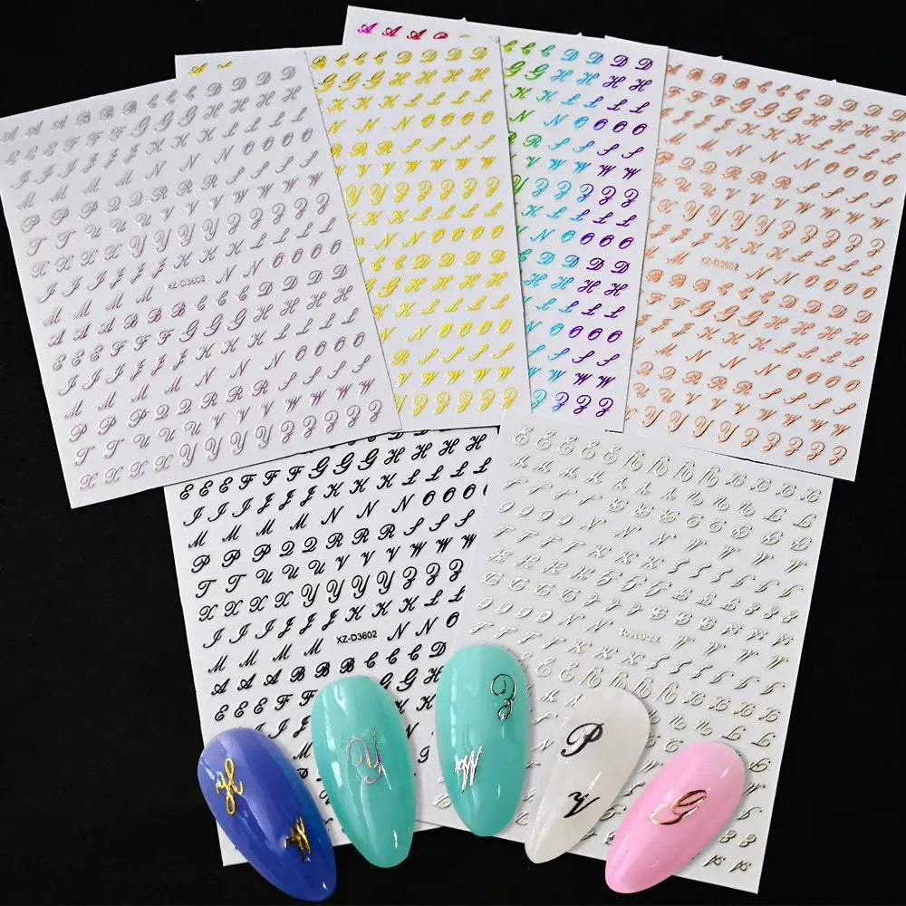 Six sheets of 3D Roman letter nail stickers, self-adhesive, in gold, silver, black and holographic colors.
