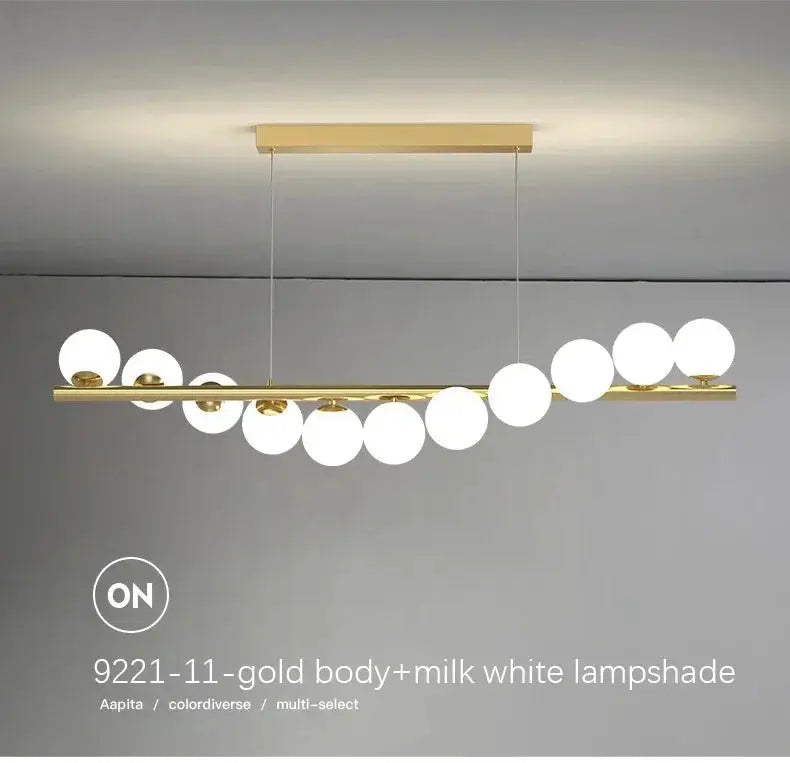 Nordic ceiling chandelier with gold bar and milk-white globe lamps by Simples Market