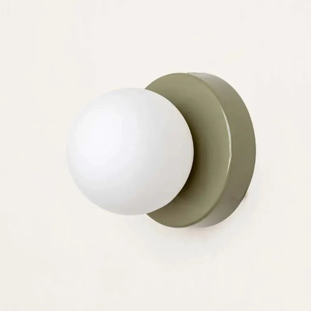 Nordic Macaron LED wall lamp by Simples Market; mini glass sconce with white globe on olive-gray backplate