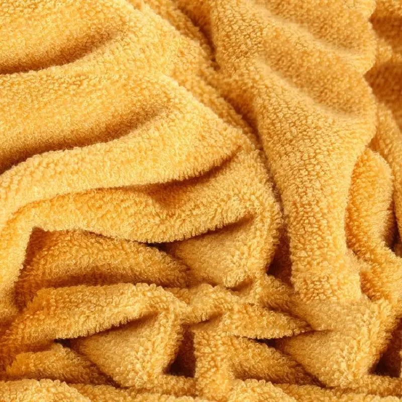 Simples Market set of 2 bamboo fiber bathroom towels in orange, 34x74cm and 70x140cm.