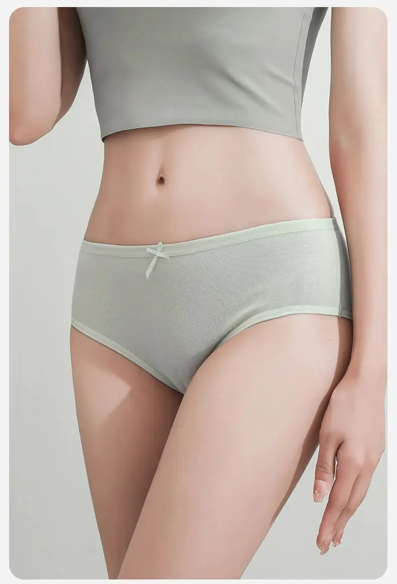 Cotton women's panties in light gray with a small front bow, breathable low-rise underwear.