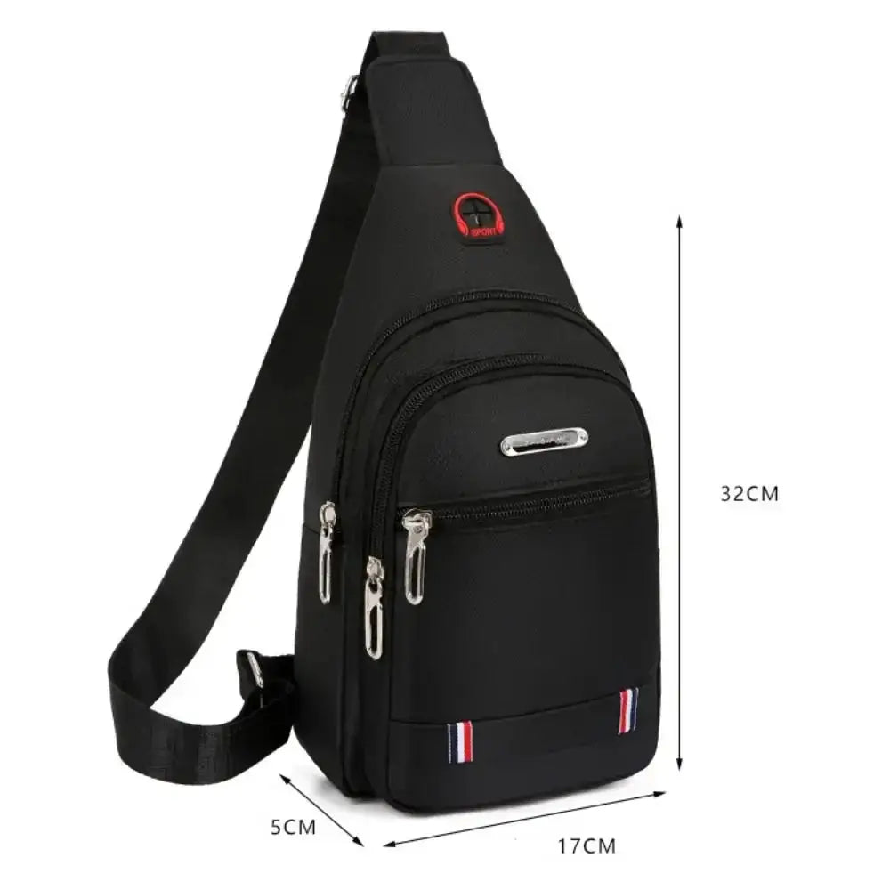 Men's black Oxford cloth crossbody sling bag with multiple zipper pockets and adjustable strap