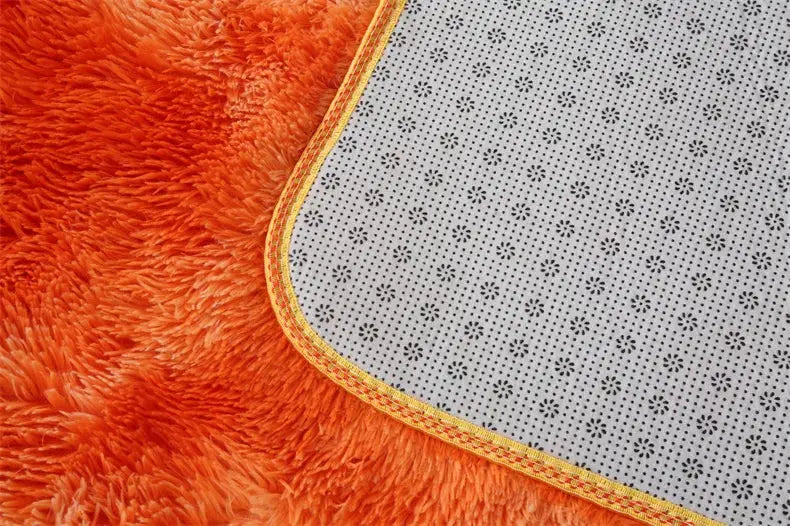Simples Market fluffy orange area rug with plush shag fibers and yellow border for living room