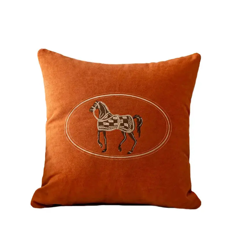 Cushion cover orange with American hand-embroidered horse pattern inside an oval frame, 45x45 cm