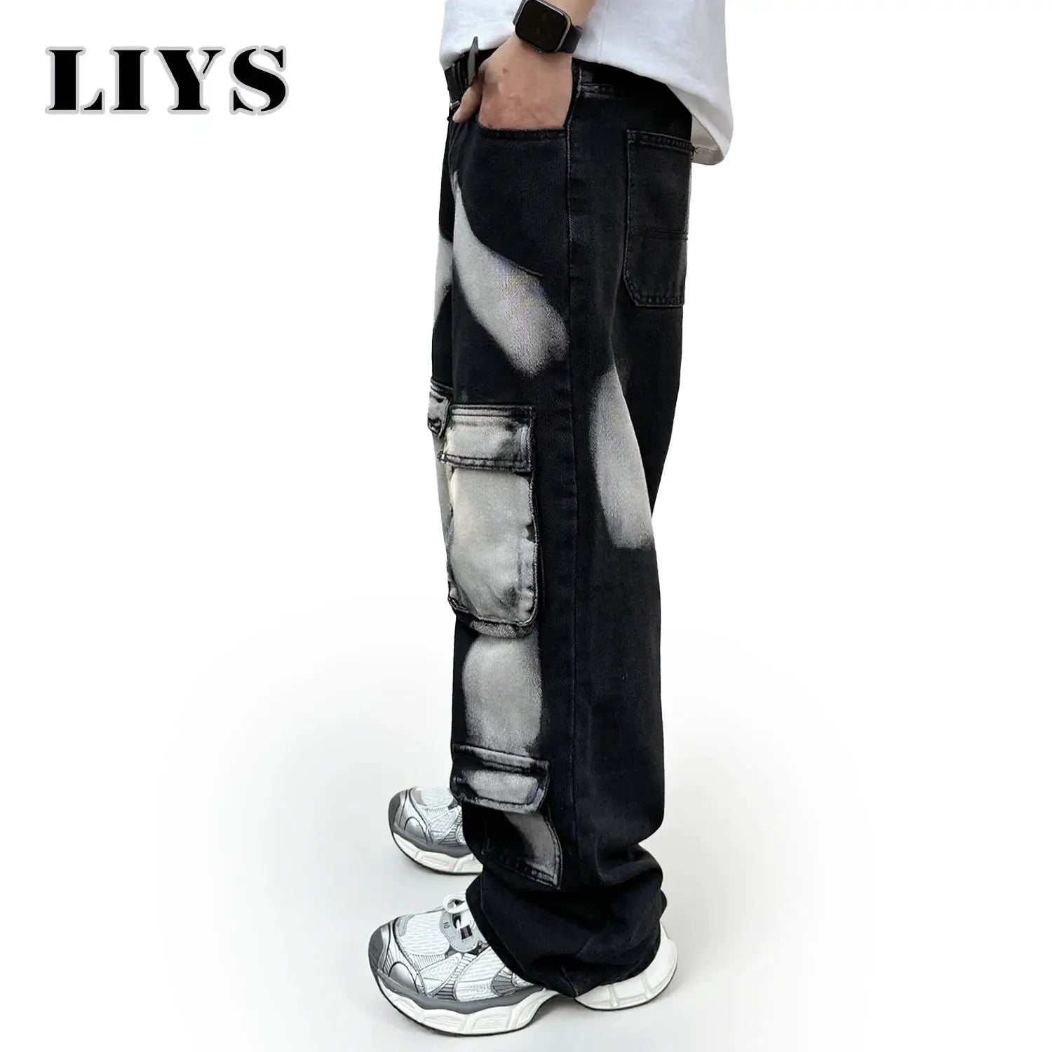 Men's black straight-leg workwear jeans with splashed ink patches and cargo pockets by Simples Market