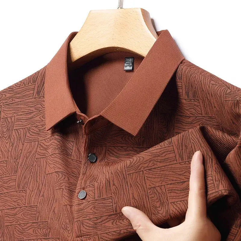 Men's polo shirt in rust brown with geometric print, short sleeves, button placket