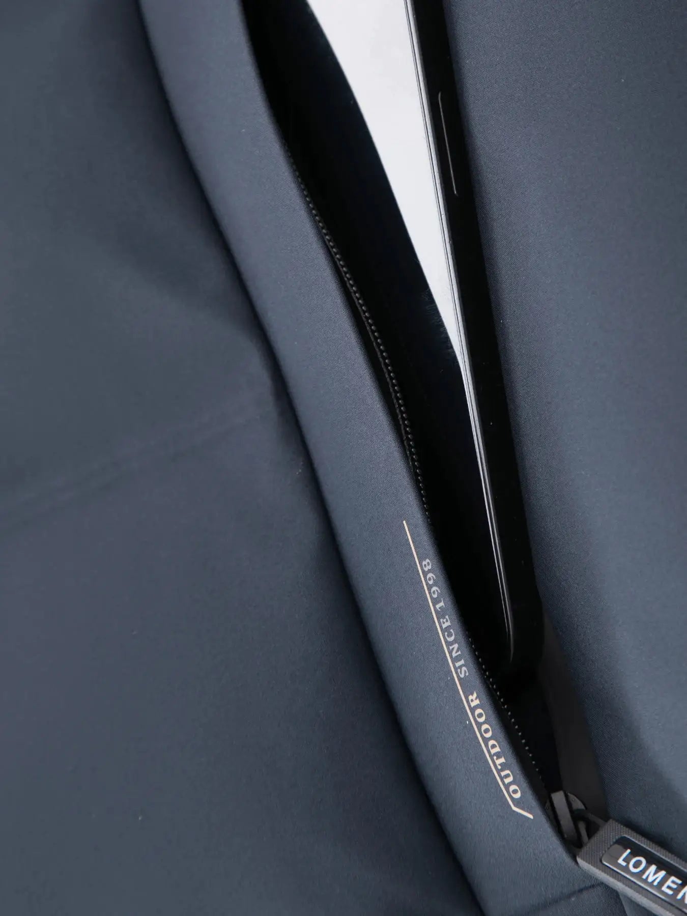 Men's navy cotton jacket with zipper detail for casual business outerwear.