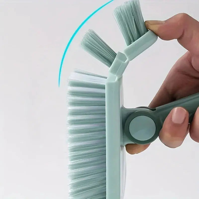 Mint green triangle floor brush with detachable long handle for bathtub and floor gaps.