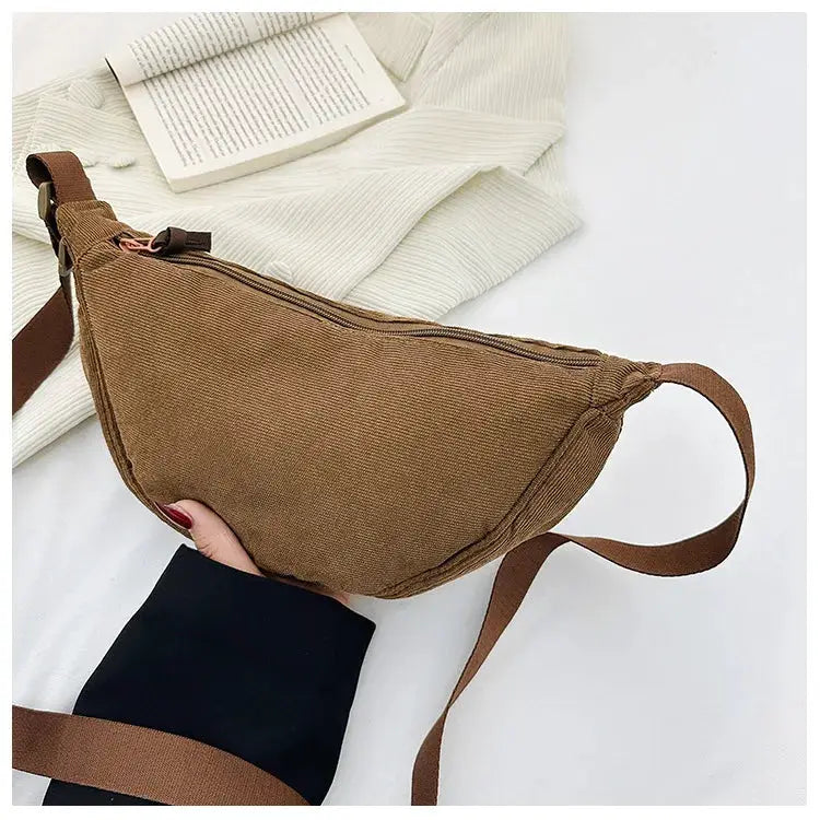 Corduroy hobo crossbody bag in brown by Simples Market with adjustable strap.
