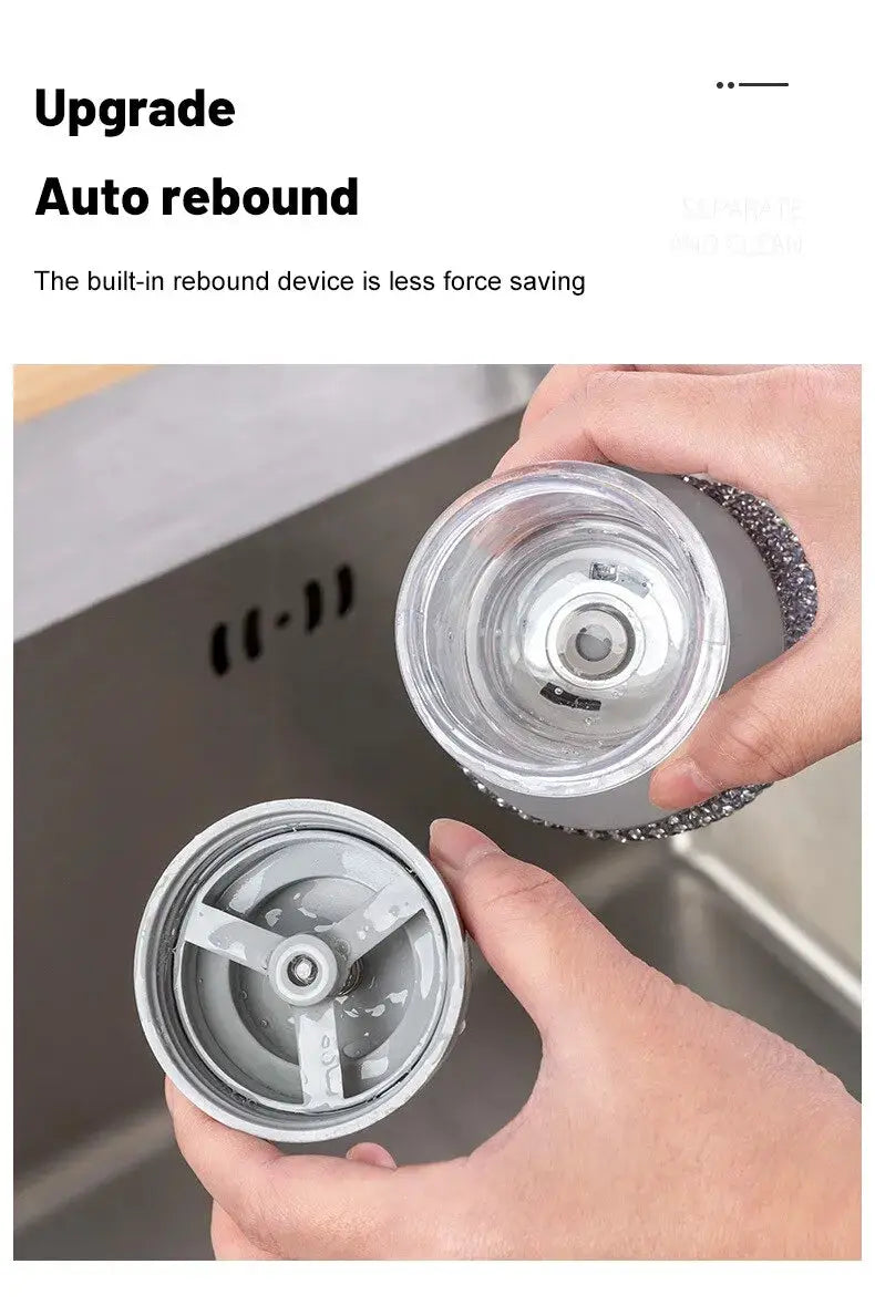 Soap-dispensing dishwashing brush with clear reservoir and gray plastic housing