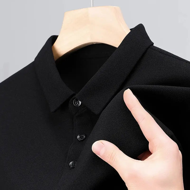 Men's black polo shirt with classic collar, short sleeves, button placket, breathable pique knit