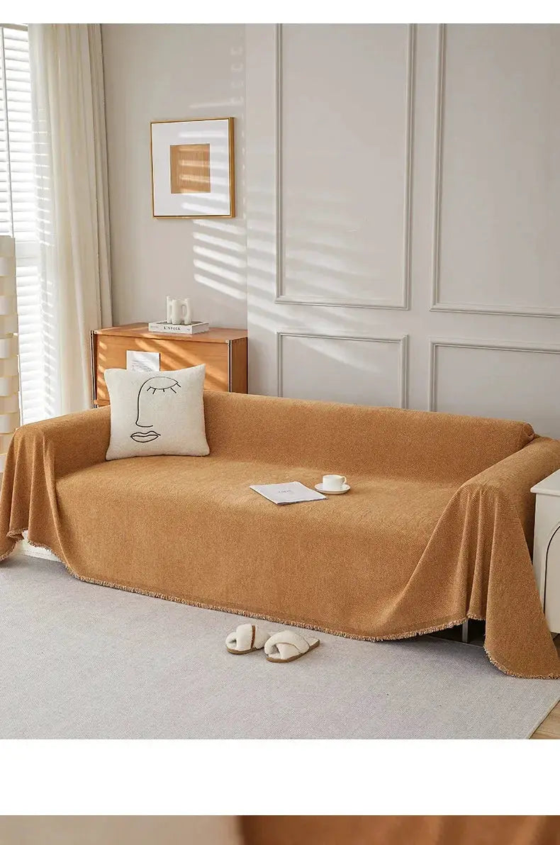 Couch cover by Simples Market in camel chenille with fringe on sofa
