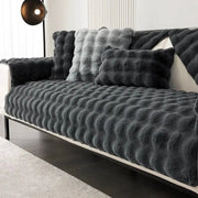 Faux rabbit fur sofa slipcover set in dark gray with non-slip backing and plush cushions by Simples Market.