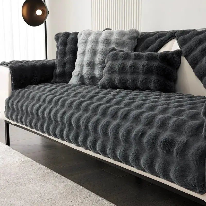 Faux rabbit fur sofa slipcover set in dark gray with non-slip backing and plush cushions by Simples Market.