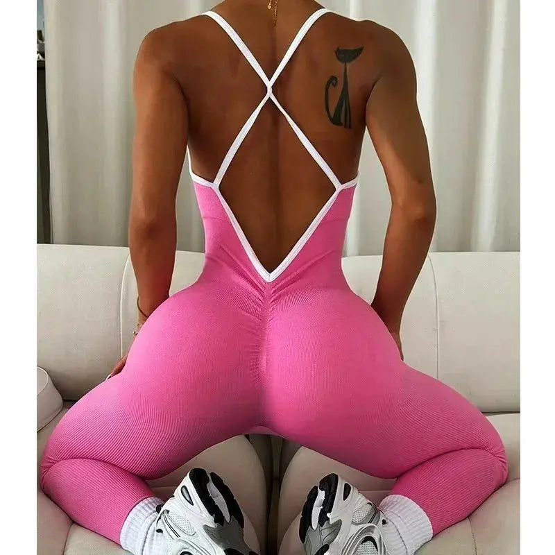 Simples Market pink ribbed seamless jumpsuit with white crisscross back straps for gym workouts