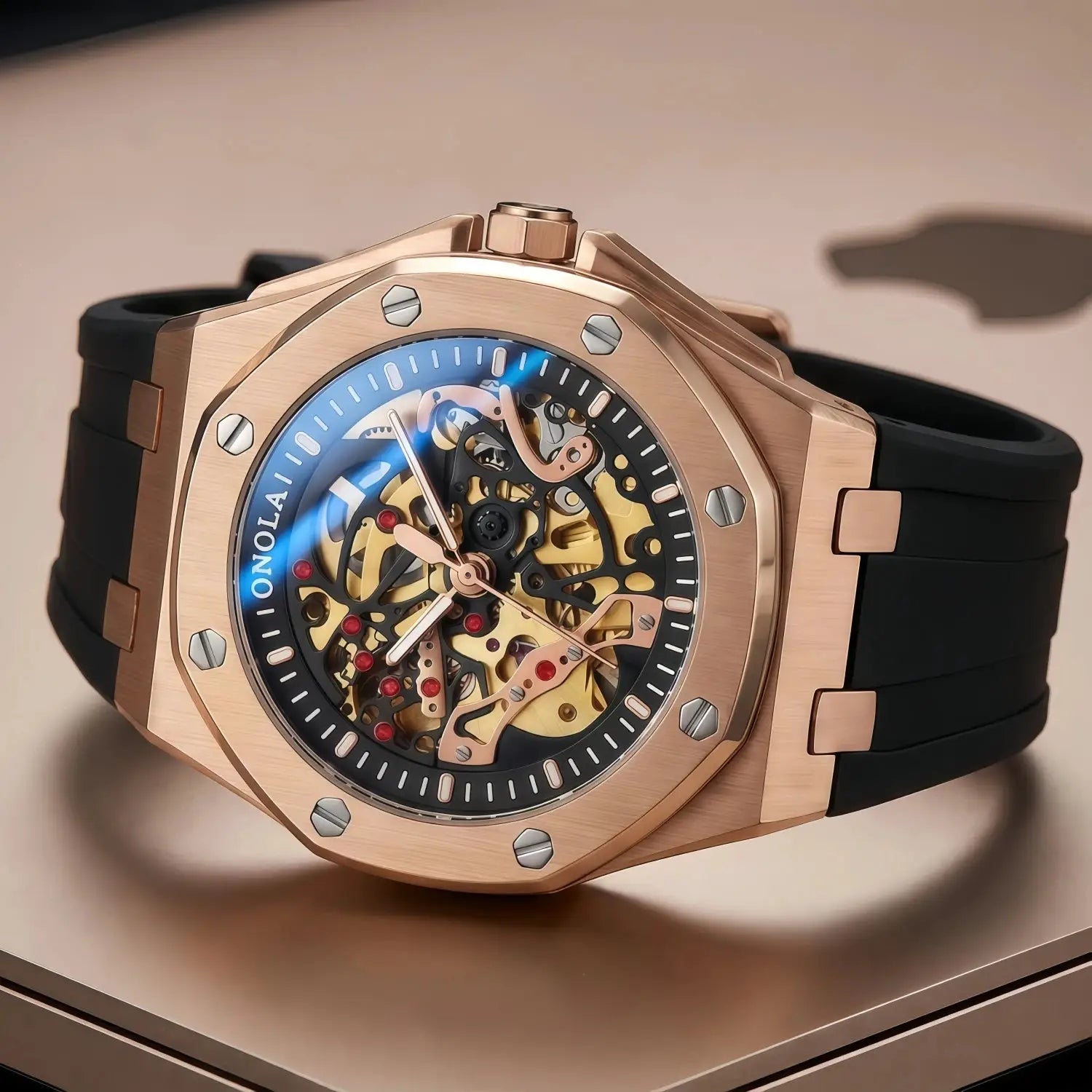 ONOLA watch with skeleton dial, rose-gold case, black rubber strap, automatic movement