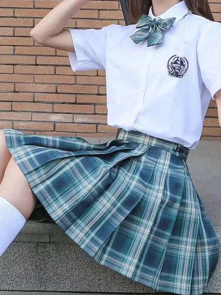 ZOKI plaid pleated skirt with bow knot; teal plaid, high-waist school uniform style worn with white blouse