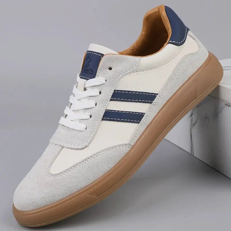 Leather sneakers in white with navy stripes and tan gum sole
