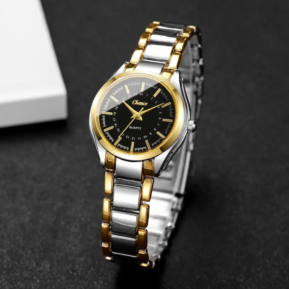 Women's two-tone gold and silver analog quartz wristwatch with black dial and gold markers