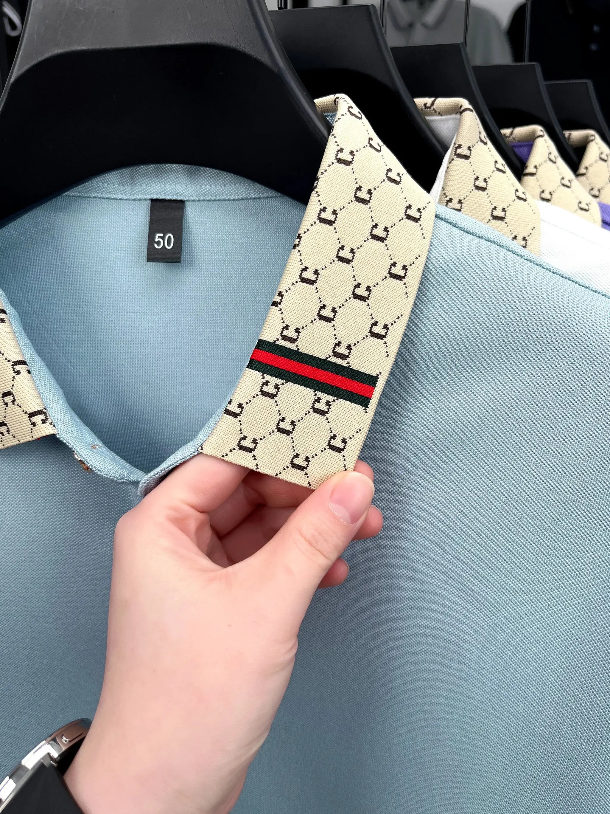 Men's polo shirt by Simples Market, light blue with beige jacquard collar, size 50.