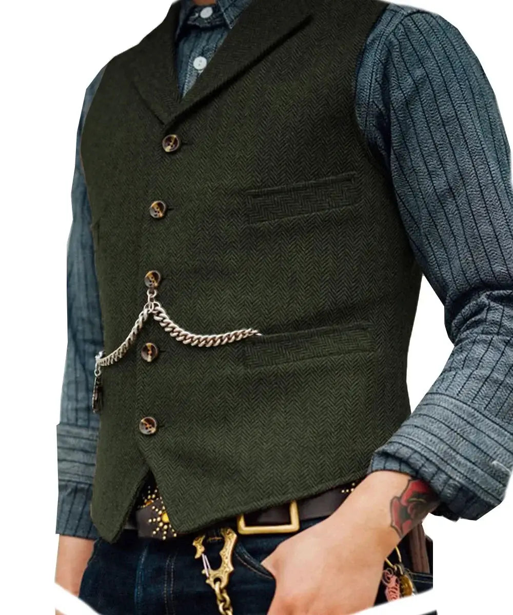 Wool tweed men's waistcoat vest in olive green with watch chain over blue shirt.