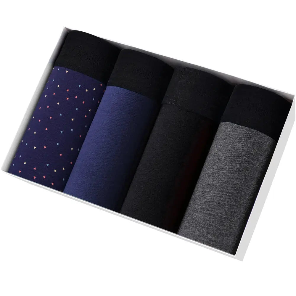 Simples Market 4-pack men's cotton boxer shorts in assorted colors: navy patterned, solid navy, black, gray.