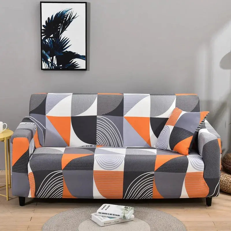 Sofa cover for living room with geometric orange-gray print and matching cushion; elastic stretch slipcover.