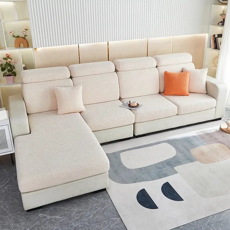 Sofa slipcover set in cream jacquard for a sectional with chaise by Simples Market; stretchy furniture protector