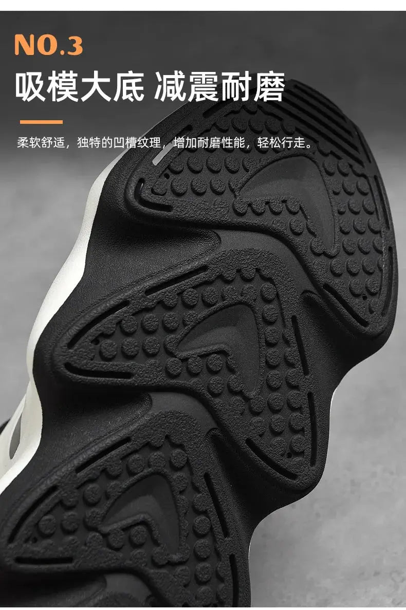 Men's sneakers outsole in black with rugged, dotted rubber tread pattern