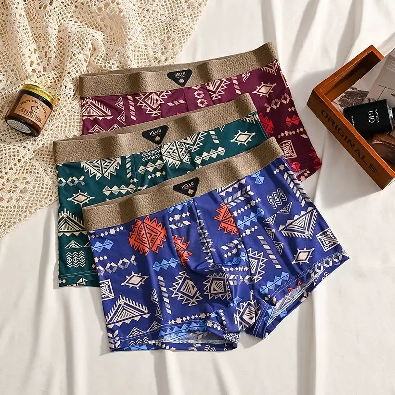 Simples Market 3-pack men's boxer shorts with tribal prints in teal, burgundy, blue; beige elastic waistbands.