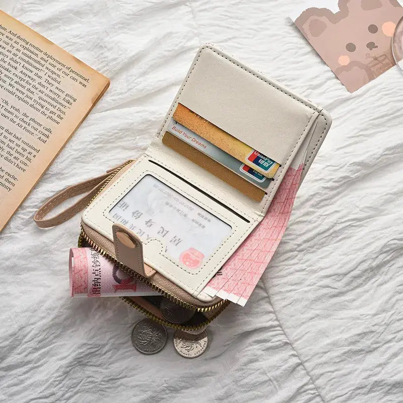 Cream faux-leather cat girls wallet with ID window, card slots and zipper coin purse