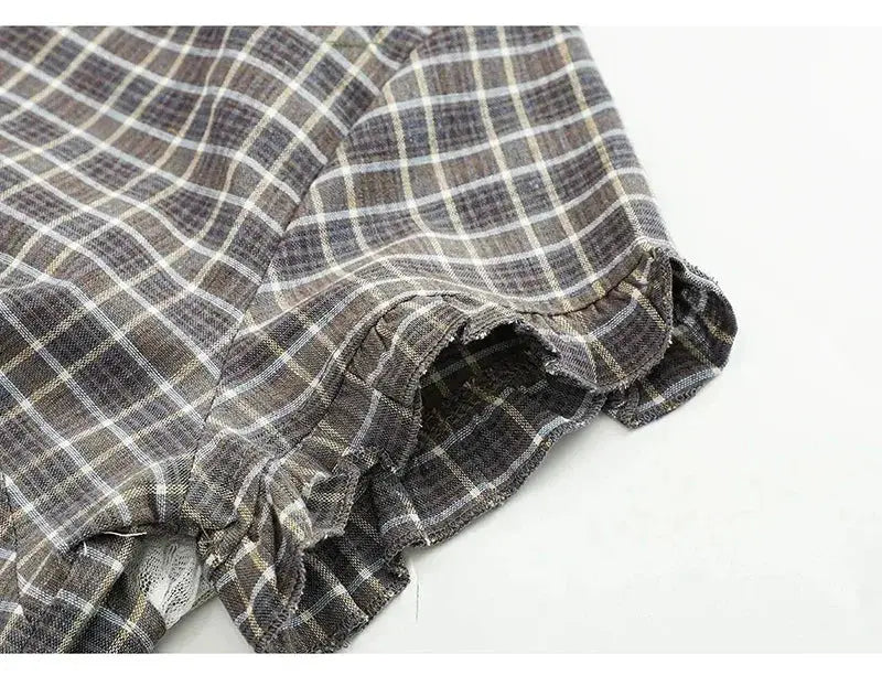 Plaid shirt for women with short sleeves and ruched, ruffled cuffs in gray-brown tones