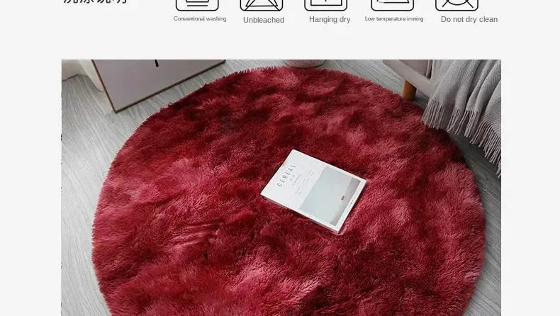 Round plush rug with thick red shag pile, shown on a light floor beside a book