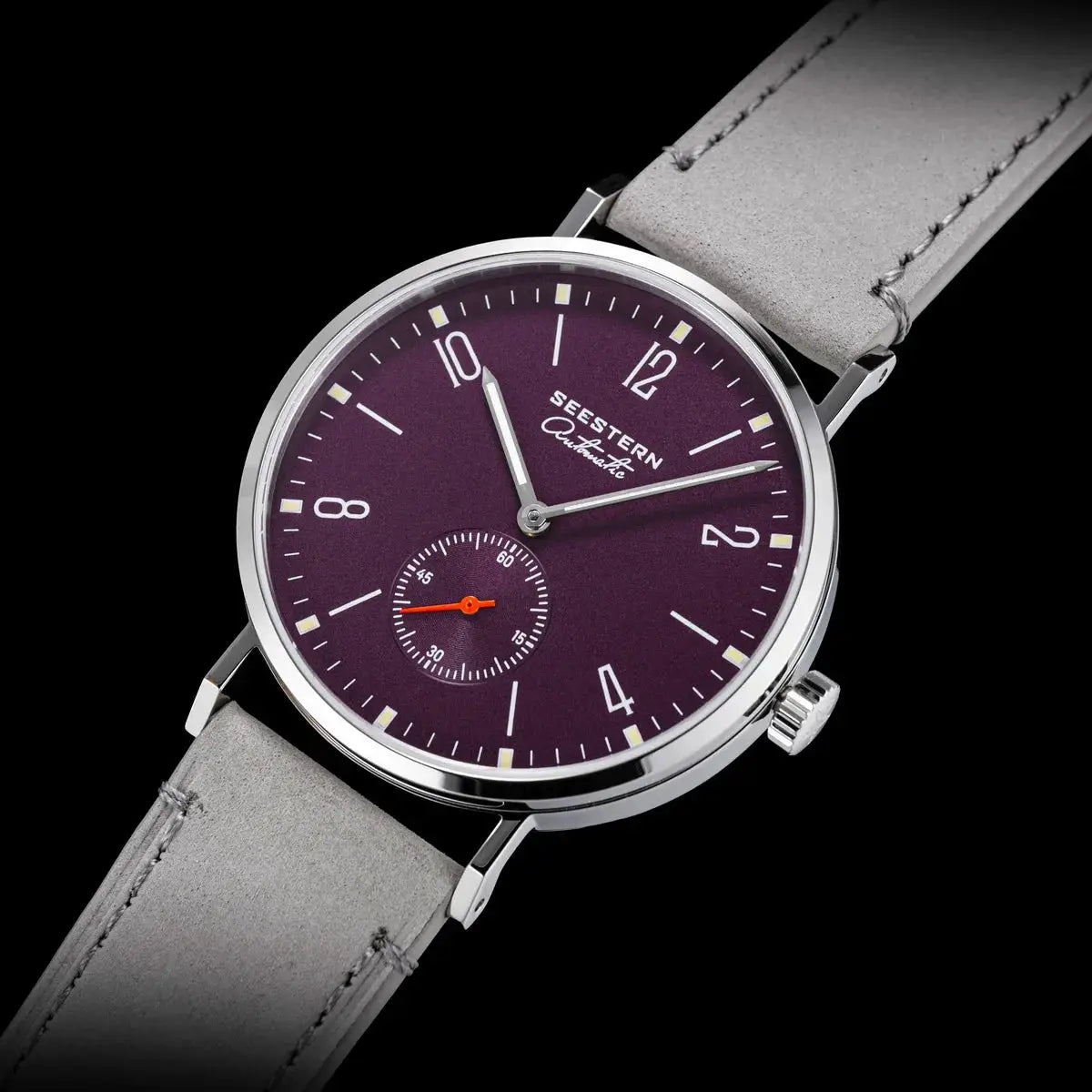 SEESTERN men's automatic wristwatch with purple dial, silver case, and gray strap