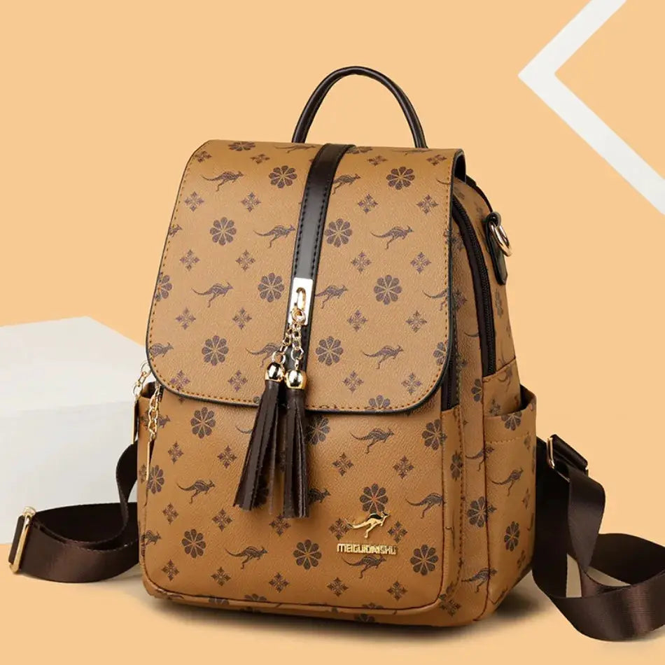 Ladies leather backpack with floral print, tan color, tassel charm, large capacity