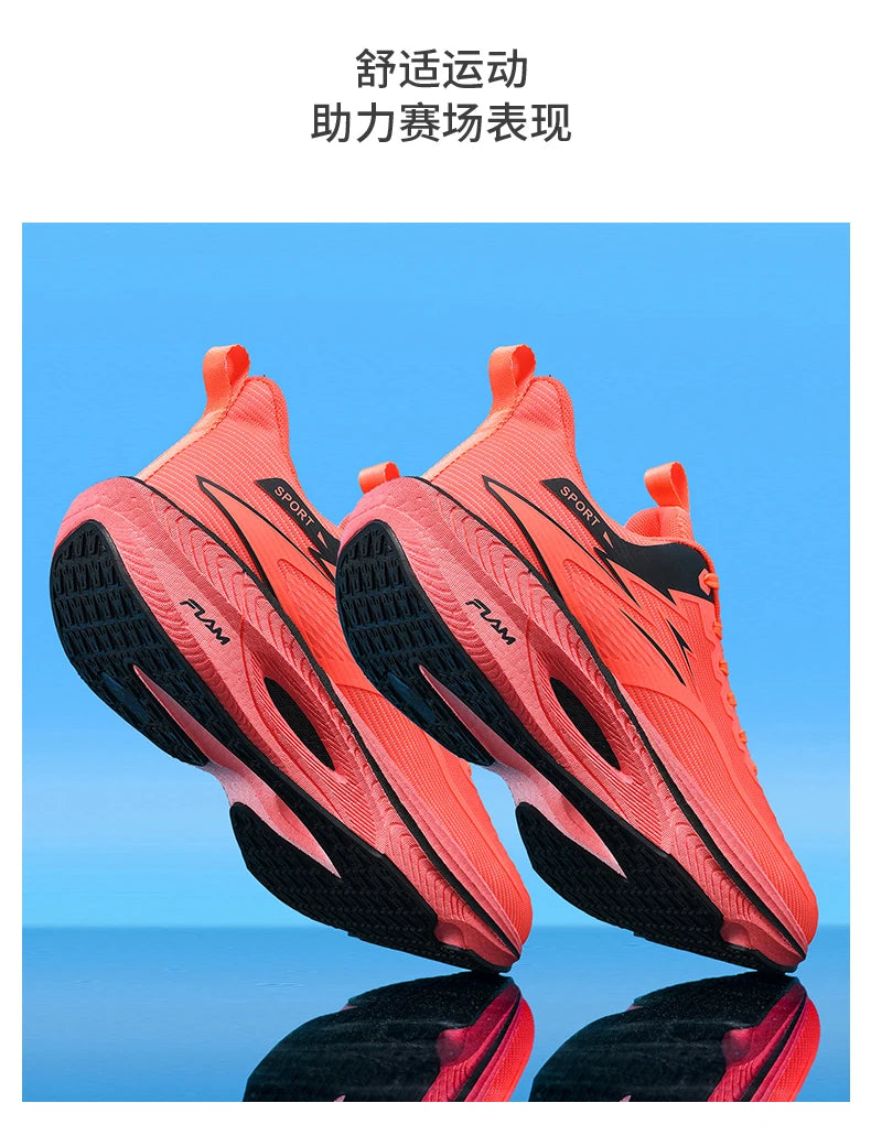 Running shoes pair in coral pink with black outsoles, lightweight athletic sneakers