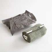 Simples Market IFAK medical trauma kit, 2-piece set with Israeli bandage and rolled olive-green gauze, gray pouch