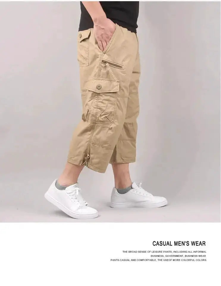 Men's cargo shorts by Simples Market; beige knee-length, elastic waist, multiple pockets.